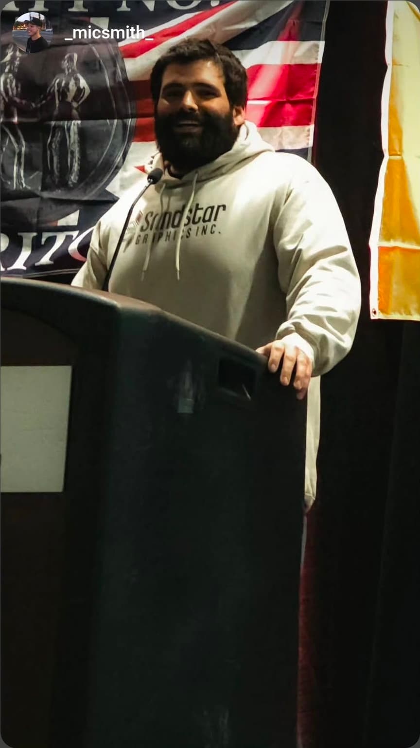 Cole Smith at podium